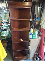 Front view showing five shelves and finish