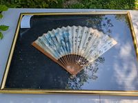Entire framed fan showing frame, glass and artwork