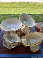 Group shot showing all three Lenox ivory and gold-trim bowls