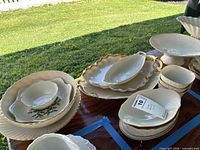 Group view of stacked Lenox platters, bowls, compote