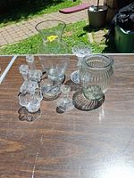 Group shot of all eight glass pieces on table