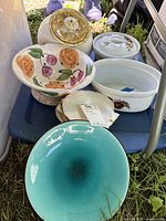 Overall view of bowls, casseroles, plate and shells