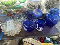 Group shot of all glass items on table