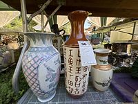 All three vases grouped: baluster, bottle, cylindrical