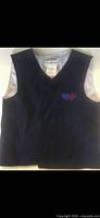 Front view of navy blue child weighted vest