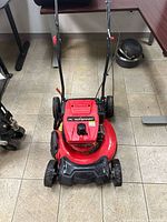 Full view of red PowerSmart self-propelled mower