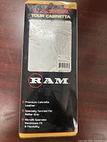 Front of sealed RAM Laser Tour Cabretta glove package showing glove through window