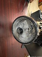 Front angled view of Vornado fan showing spiral grill and power cord