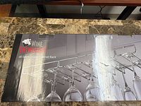 Front of retail box showing Wine Enthusiast 18-Stem Under Cabinet Rack image