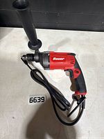 Bauer hammer drill with cord and detached side handle