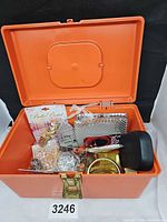 Overall view of orange bin and contents