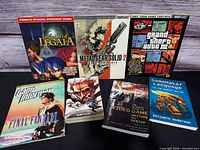 Group shot of all seven publications laid out