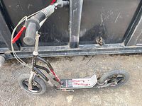 Full side view of Kent Pipeline scooter showing frame, wheels and overall wear