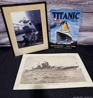 Group view of Titanic tin sign, USS New Mexico photo, and framed color ship photo