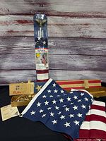 Sealed Annin flag set, preowned folded flag, brass hardware, wood case