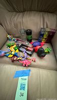 Group shot of all toys on chair seat