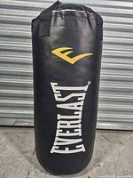 Front view of Everlast heavy bag showing logo and overall condition