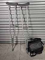 Full view of both crutches and carrying bag