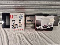 All four boxed items side by side
