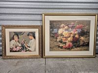 Both framed prints side by side showing size comparison and frame style