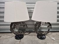 Pair of table lamps showing shades, bodies and bases