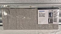 Front view of packaged shoe organizer