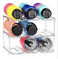 Assembled 3-tier acrylic organizer shown with bottles for scale