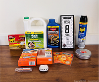 Group shot of all pest control products on table