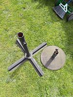Round weighted base and cross-base stands side by side