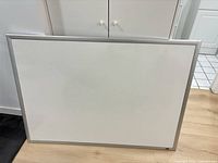 Front view of whiteboard showing writing surface and aluminum frame