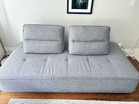 Front view of grey Structube Chameleon sofa showing seat and back cushions