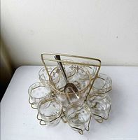 Full set arranged in caddy showing all pieces