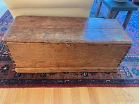Top and front view of wooden blanket chest