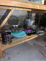 Group shot of assorted bakeware on shelf