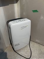 Front view of Garrison dehumidifier showing overall appearance