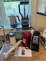 Group shot of all seven appliances on countertop