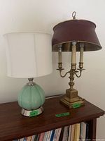 Front view of both lamps on shelf