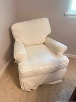 Front view of white upholstered lounge chair