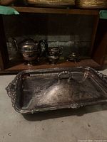 Front view showing all five silver-plated pieces