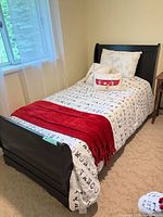 Bed frame in room, headboard view