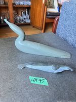 Both soapstone carvings side by side