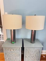 Both lamps side by side on tables