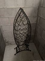 Full front view of fish-shaped wine rack
