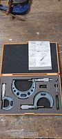 Complete Mitutoyo micrometer set in case with standards, wrench and manual
