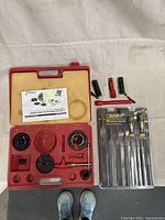 Overview of chuck system case, file set blister pack, four flashlights