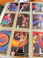 Nine NBA SkyBox cards including Tim McCormick, Mark Bryant, Ralph Sampson