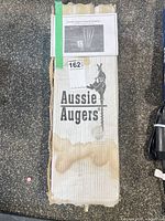 Front view of boxed Aussie Augers ground mount kit