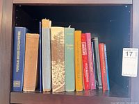 Shelf view of all ten books