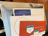 Stack showing 1973, 1972, 1965 Canada stamp booklets