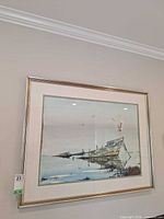 Full view of framed print on wall